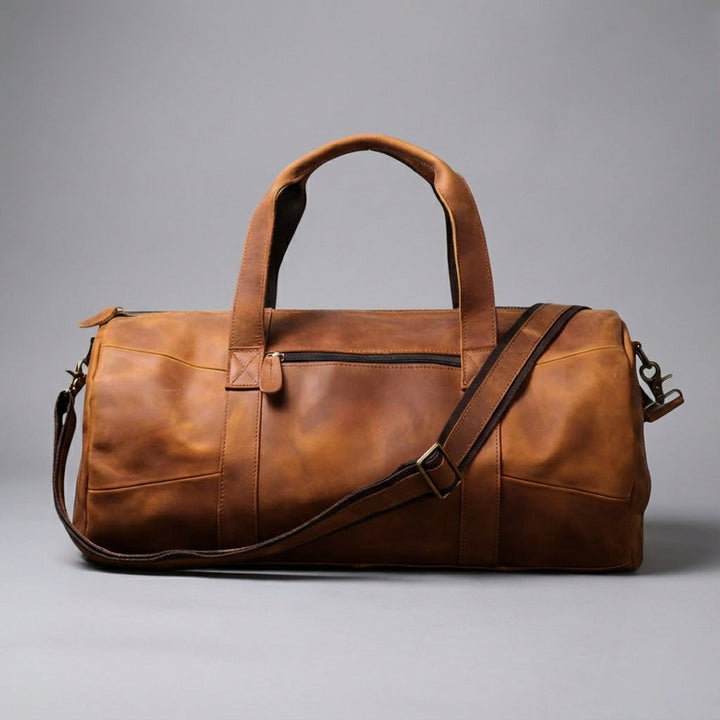 Veelzijdige Gripwell unisex reistas, verkrijgbaar in bruin en zwart, met praktische schouderband voor comfort.