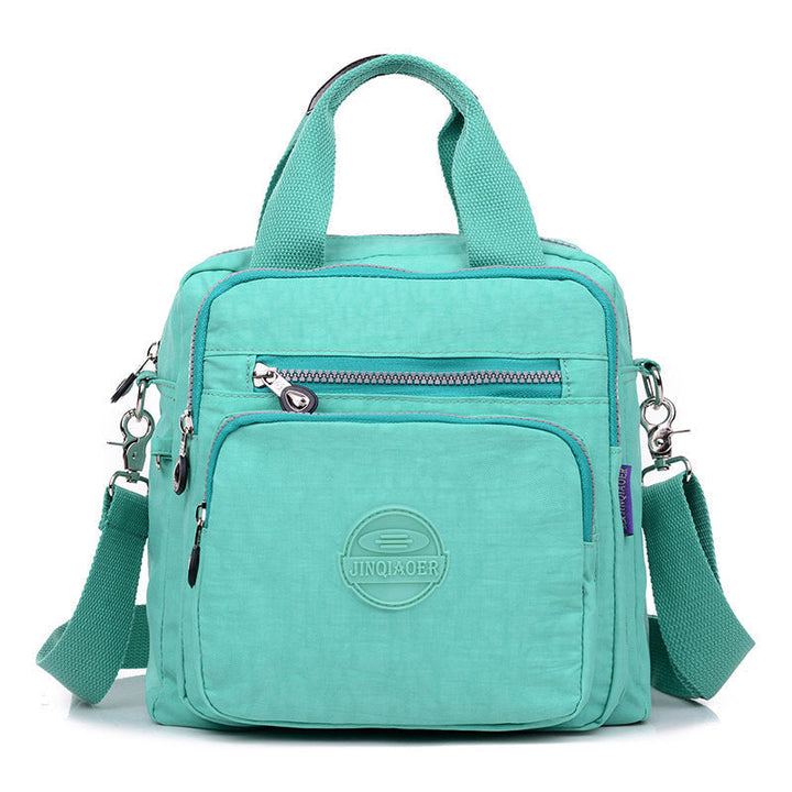 Waterdichte crossbody tas voor dames met veilige ritssluitingen, beschermt je waardevolle spullen.