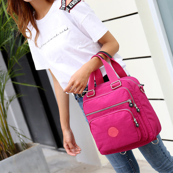 Dames waterdichte multifunctionele crossbody tas met rits, ideaal voor bescherming van je spullen.