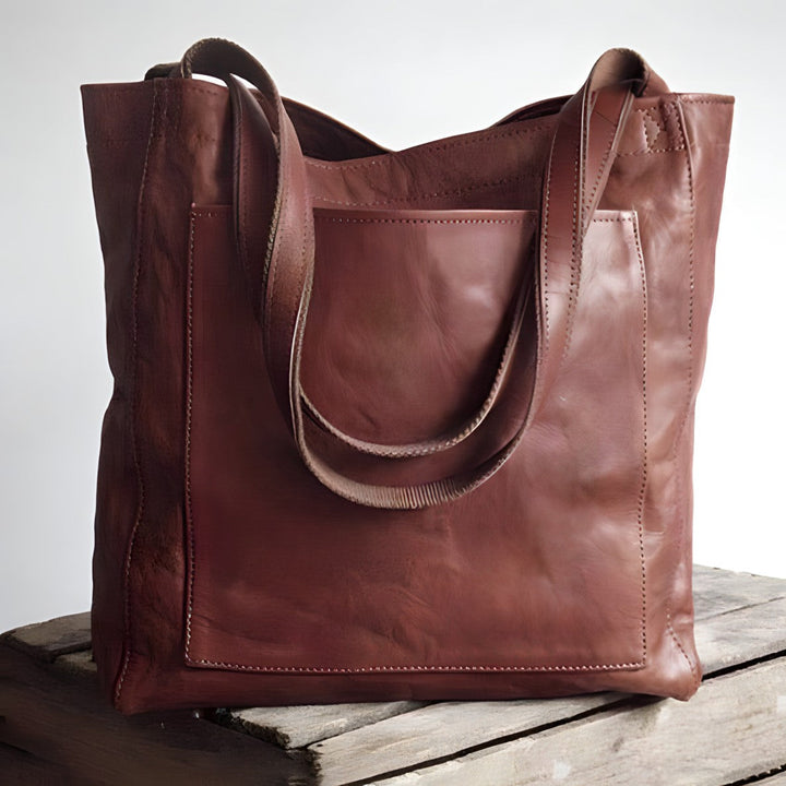 Detail van de textuur van de zwarte Sophie PU-leren damestas, elegant en duurzaam accessoire voor dames.