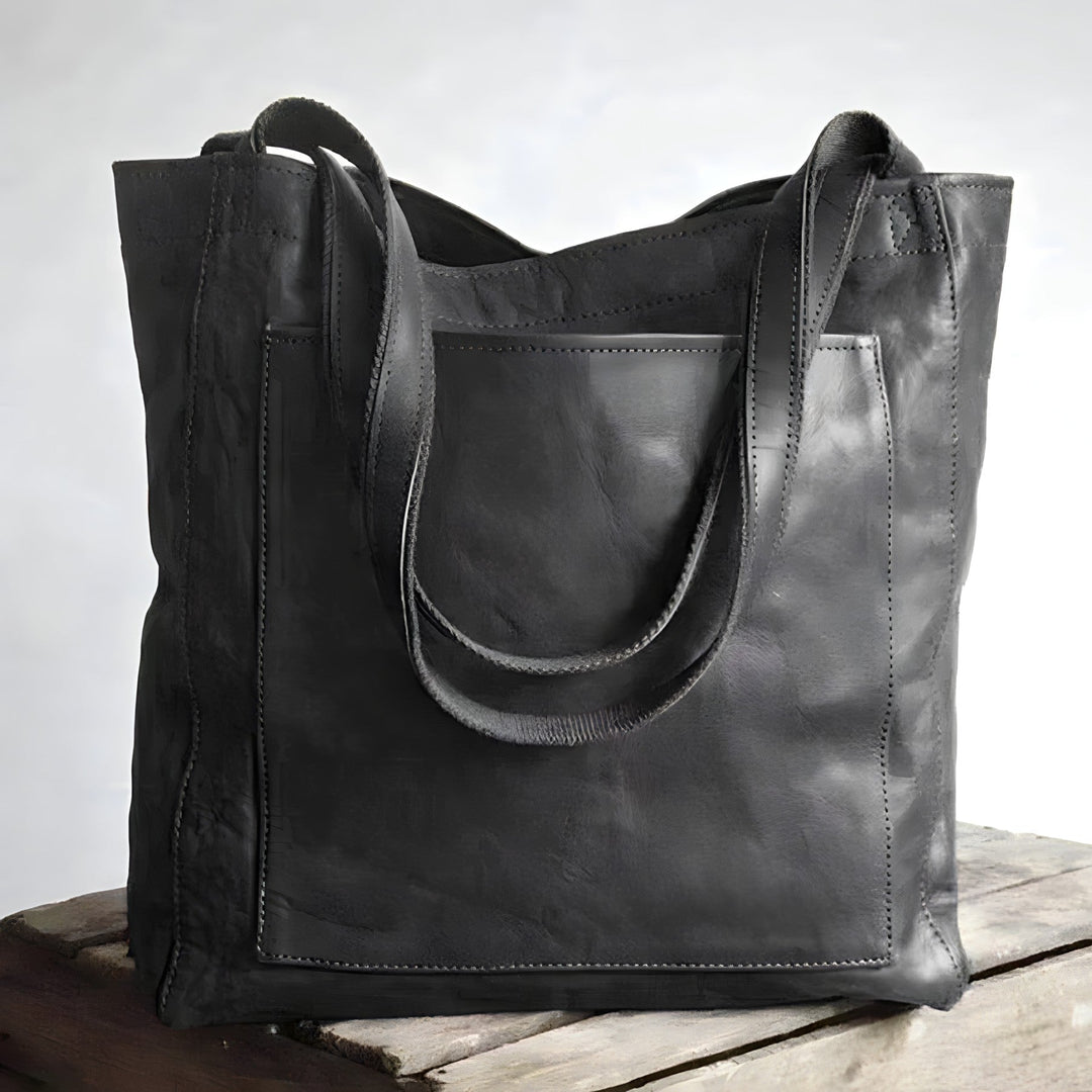 Veelzijdige bruine Sophie handtas van PU-leer, combineert stijl en functionaliteit voor moderne dames.