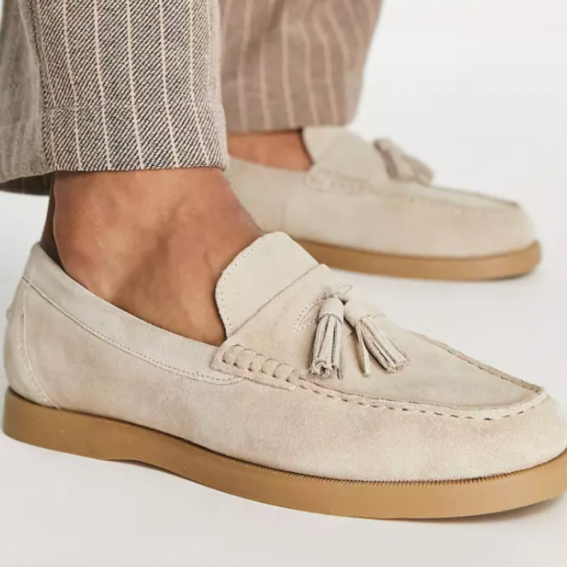 Stijlvolle herenloafers, elegant en comfortabel, hoogwaardige materialen, donkere leertint, ideaal voor kantoor en vrije tijd.