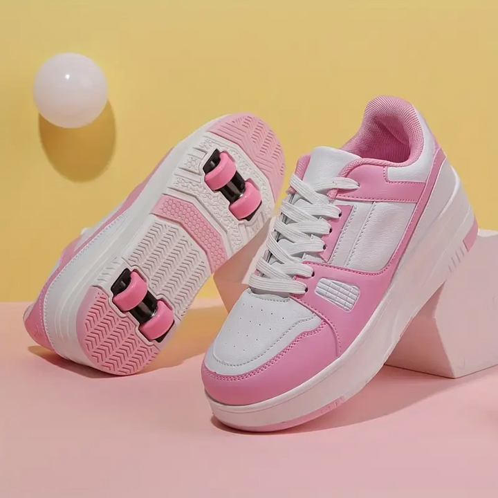 Stijlvolle kinderrolschaatsen met afneembare wielen voor buitenavonturen, die een actieve levensstijl bevorderen. Roze, zwart en wit beschikbaar.