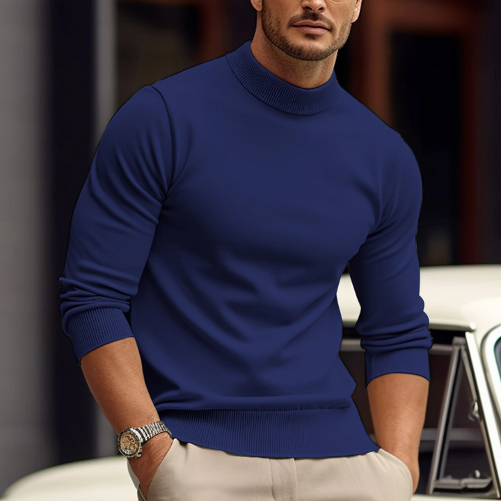 Details van de katoenen herensweater, met focus op de textuur en verfijnde afwerking.