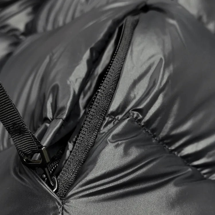 Stijlvolle dames dons winterjas, waterdicht, elegant, zwarte kleur, houdt warm en biedt optimale bescherming.