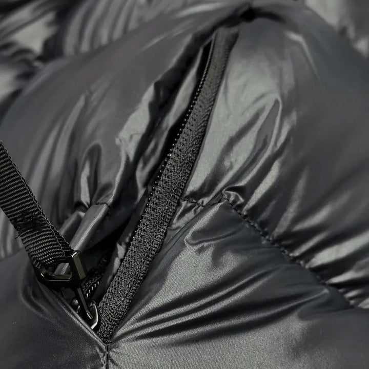 Stijlvolle dames dons winterjas, waterdicht, elegant, zwarte kleur, houdt warm en biedt optimale bescherming.