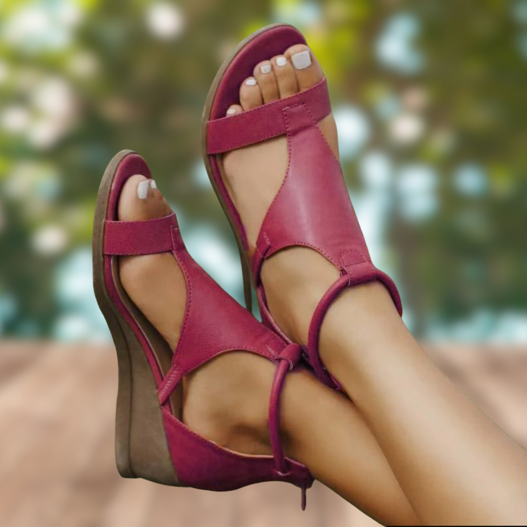Moderne orthopedische leren sandalen voor dames in wijnrood, met anatomisch gevormd voetbed en stevige hak.