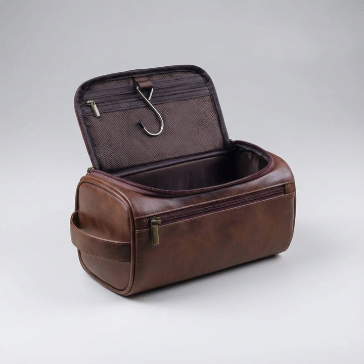 Zwarte Toilevo reistoilettas met stevige ritsen. Essentiële reisaccessoire voor dames en heren.