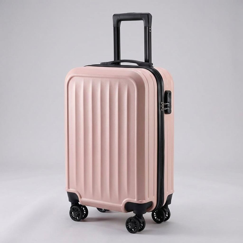 Unisex Traveon geribbelde koffer in trendy roze, perfect voor reizen. Lichtgewicht, stevig en voorzien van 360° zwenkwielen.