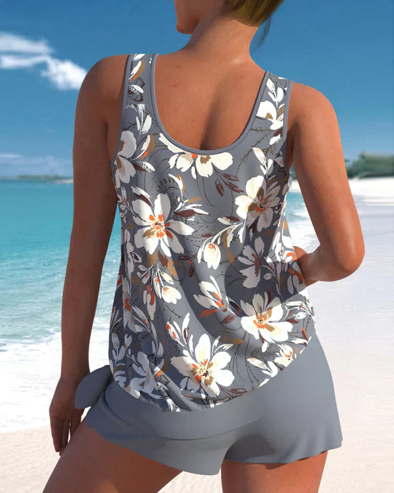 Trendy dames tankini in blauw met modern design, perfecte badmode voor strand of zwembad, biedt stijl en comfort.