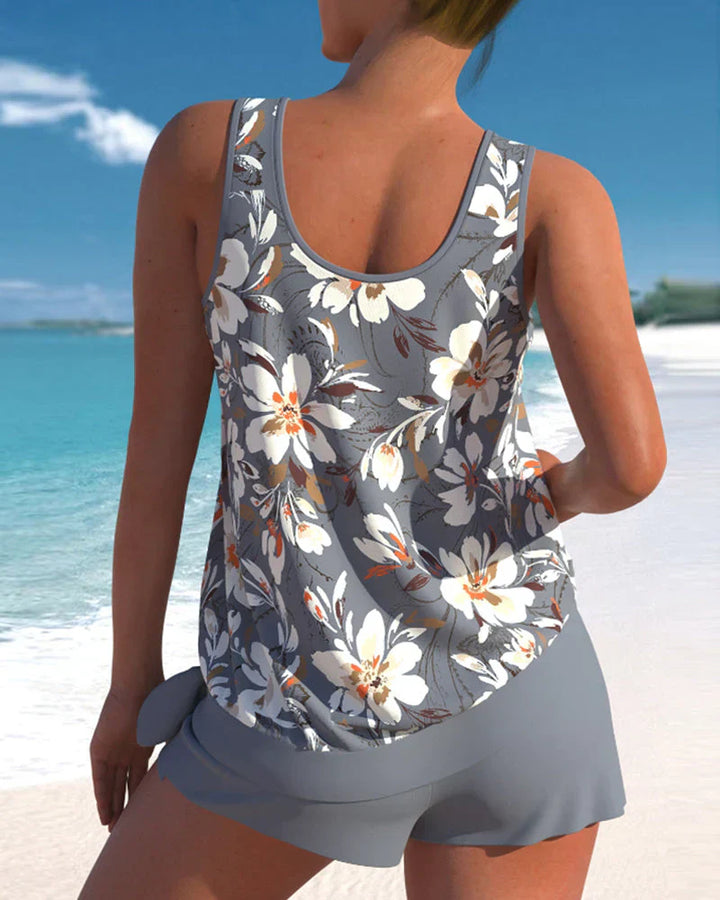 Trendy dames tankini in blauw met modern design, perfecte badmode voor strand of zwembad, biedt stijl en comfort.