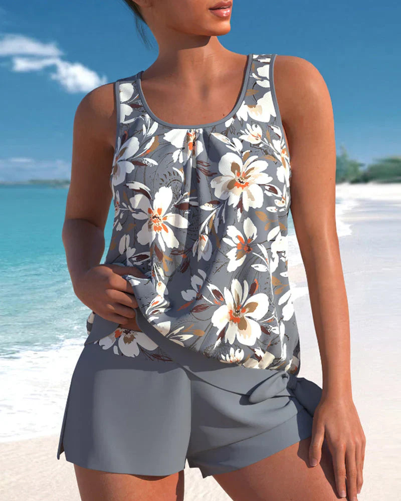 Trendy dames tankini in blauw met modern design, perfecte badmode voor strand of zwembad, biedt stijl en comfort.