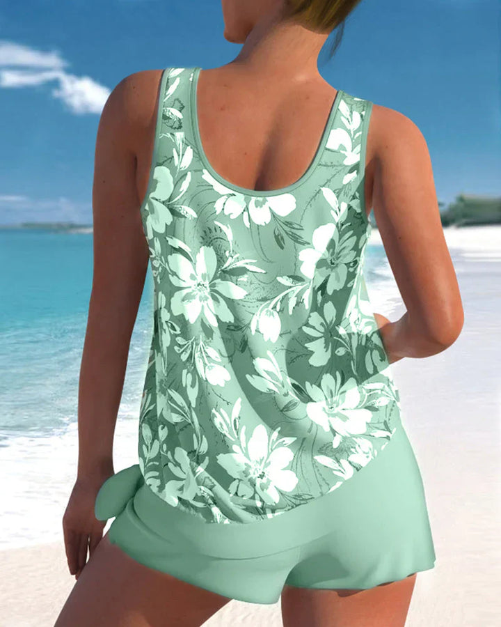 Trendy dames tankini in blauw met modern design, perfecte badmode voor strand of zwembad, biedt stijl en comfort.