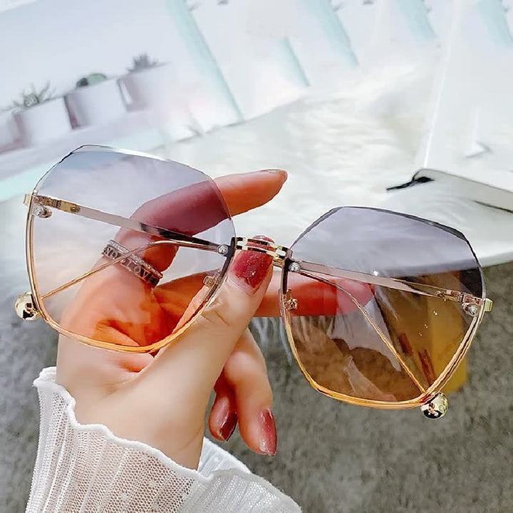 Trendy dames zonnebril met grote glazen, perfect voor zomerse mode en stijlvolle oogbescherming.