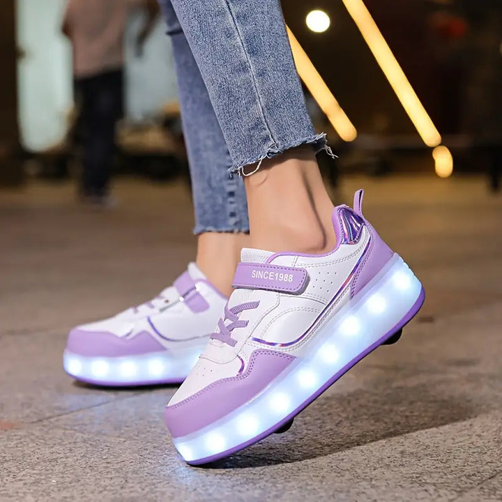Jeugdschoenen: Actieve GlideGlow rolschoenen in roze/paars met LED-verlichting. Perfect voor buitenspeelplezier.