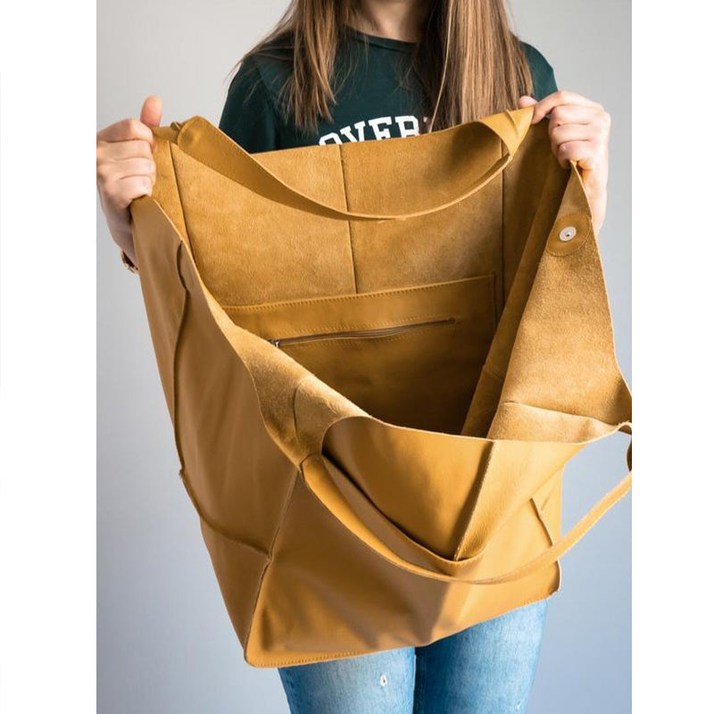 Extra grote elegante leren weekendtas met modern design in veelzijdige kleuren, perfecte dames tas.