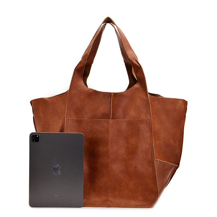 Extra grote elegante leren weekendtas met modern design in veelzijdige kleuren, perfecte dames tas.