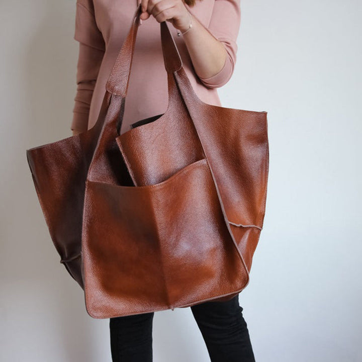 Extra grote elegante leren weekendtas met modern design in veelzijdige kleuren, perfecte dames tas.