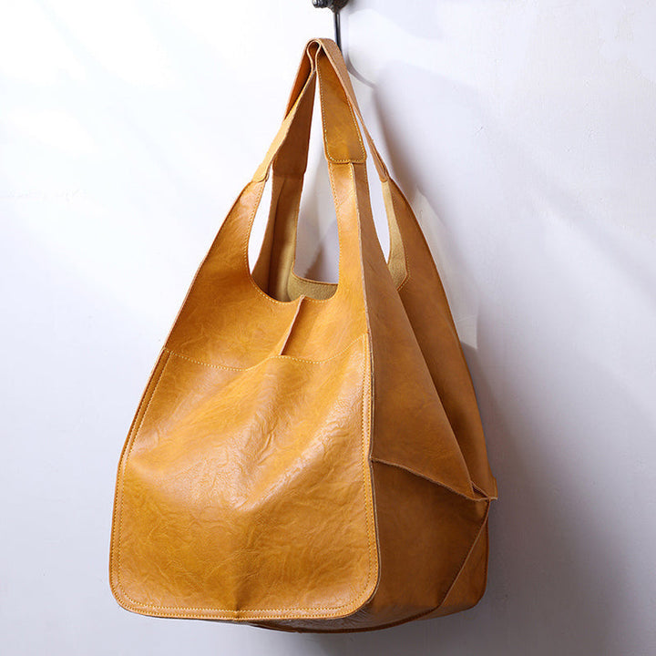 Extra grote elegante leren weekendtas met modern design in veelzijdige kleuren, perfecte dames tas.