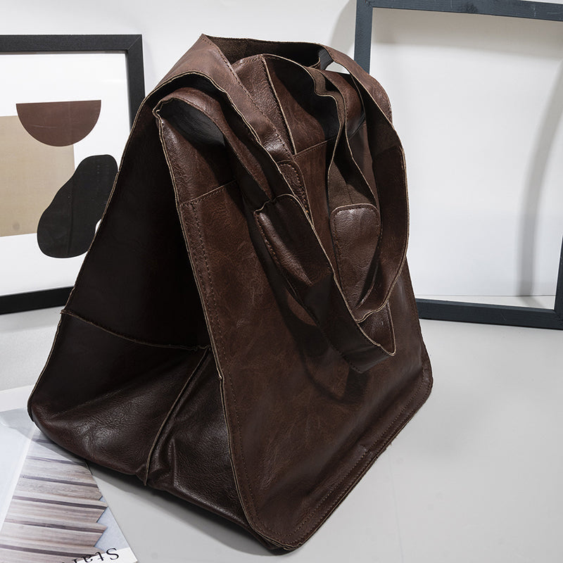 Extra grote elegante leren weekendtas met modern design in veelzijdige kleuren, perfecte dames tas.
