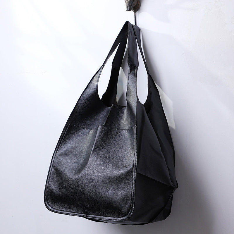 Extra grote elegante leren weekendtas met modern design in veelzijdige kleuren, perfecte dames tas.