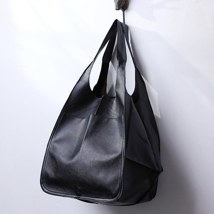 Extra grote elegante leren weekendtas met modern design in veelzijdige kleuren, perfecte dames tas.