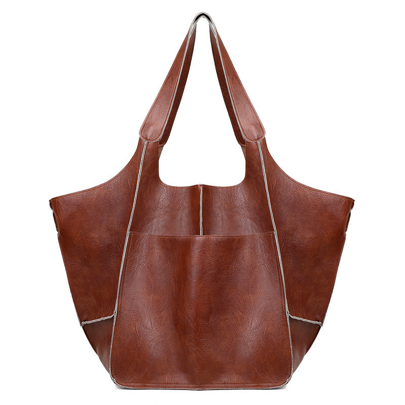 Extra grote elegante leren weekendtas met modern design in veelzijdige kleuren, perfecte dames tas.