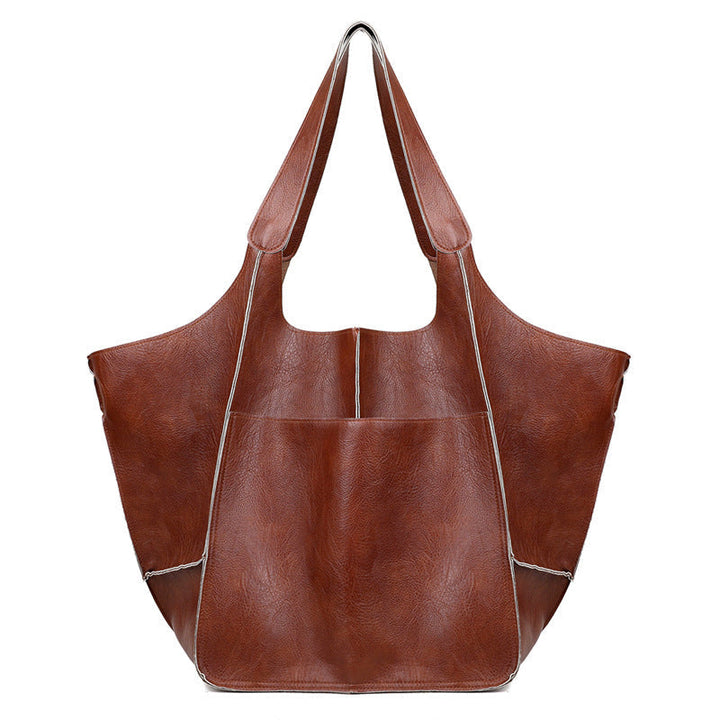 Extra grote elegante leren weekendtas met modern design in veelzijdige kleuren, perfecte dames tas.
