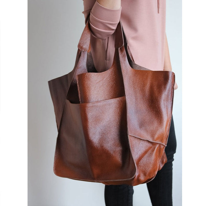 Extra grote elegante leren weekendtas met modern design in veelzijdige kleuren, perfecte dames tas.