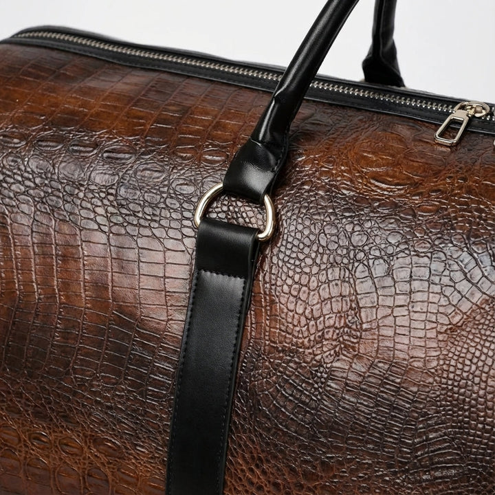 Zwarte/donkerbruine Spaceline reistas, ideale handbagage en weekendtas met verstelbare schouderband voor reizen.