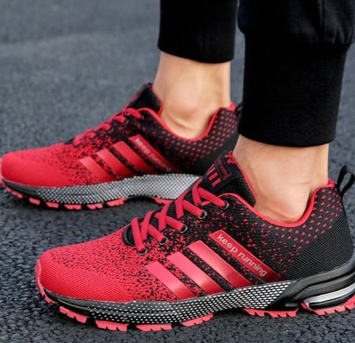 Zijaanzicht van de AeroFlex orthopedische sneaker, met focus op de schokdempende anti-slip zool voor voet ondersteuning.