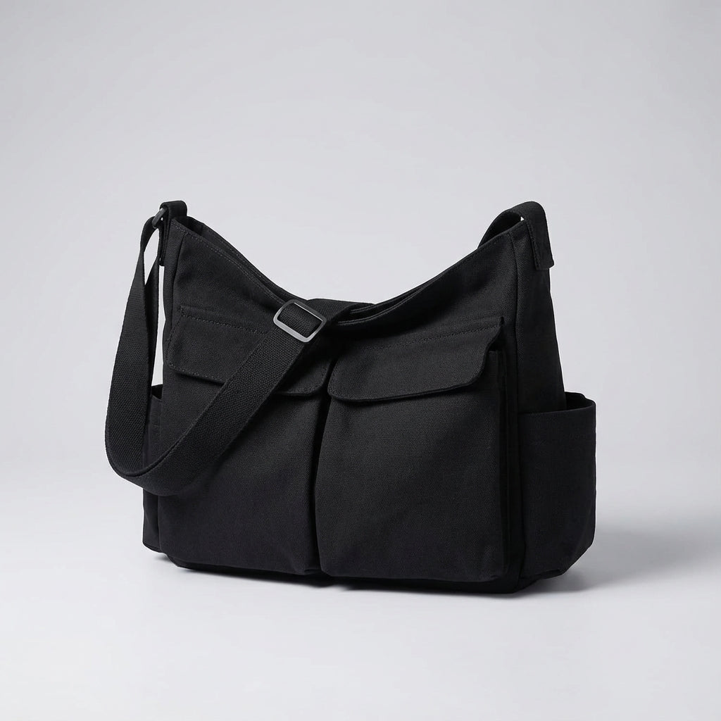 Duurzame canvas messenger tas; een stevige schoudertas voor langdurig dagelijks gebruik. Praktisch unisex design.