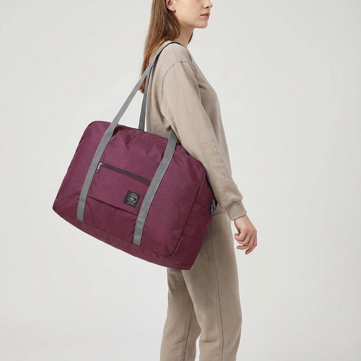 Extra lichte FoldLite weekendtas met comfortabele handvatten, de ideale opvouwbare reistas voor korte trips.