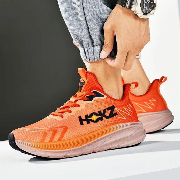Actieve unisex hardloopschoenen. Ontworpen voor prestaties en comfort tijdens sport en fitness. Robuuste sneakers.