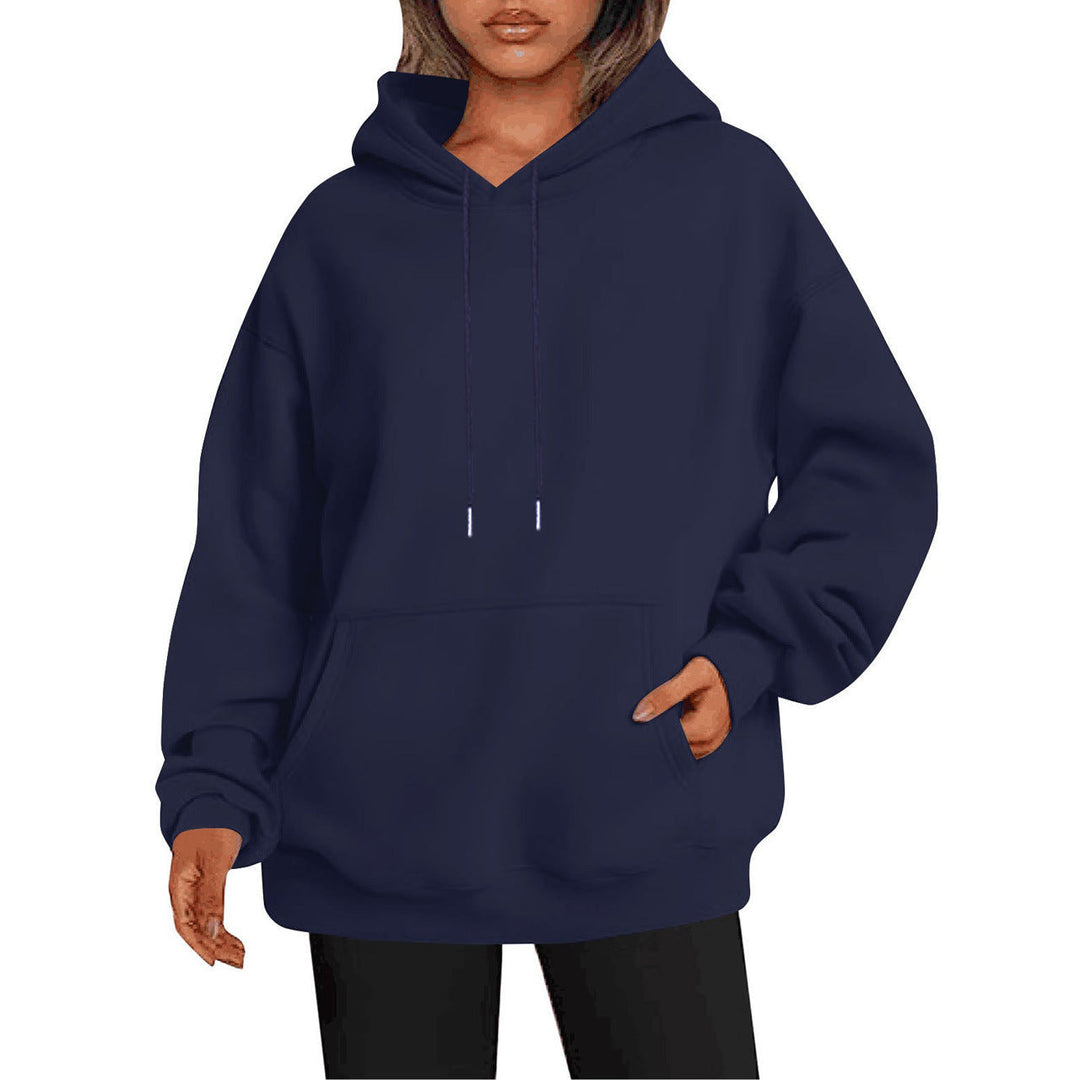 Zijkant van de unisex hoodie, met nette afwerking en pasvorm.