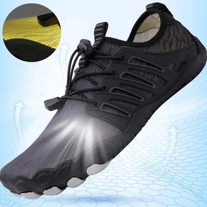 Stijlvolle BioStride PRO 2.0 orthopedische barefoot schoenen, unisex model met ademend materiaal en brede pasvorm.