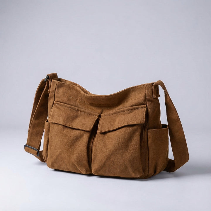 Detailfoto van de Packlite unisex organisertas; toont ruime vakken, ritsen en stevig canvas materiaal.