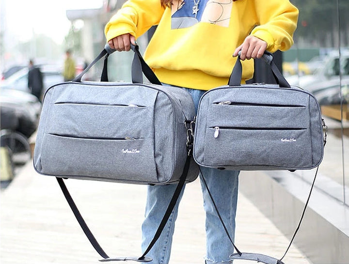 Unisex reistas van nylon met trolleybevestiging, ideaal als handbagage voor weekendtrips en zakenreizen.