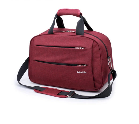 Detail van de stevige ritssluiting op de waterafstotende nylon reistas, ideaal voor handbagage.