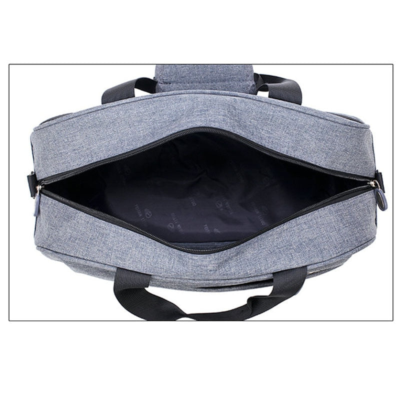Compacte weekendtas unisex met slimme trolleybevestiging, ideaal voor korte reizen en vluchten.
