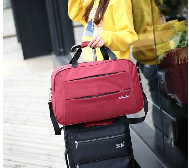Veelzijdige convertible carry-on bag, te gebruiken als handbagage of bevestigd aan een trolley.
