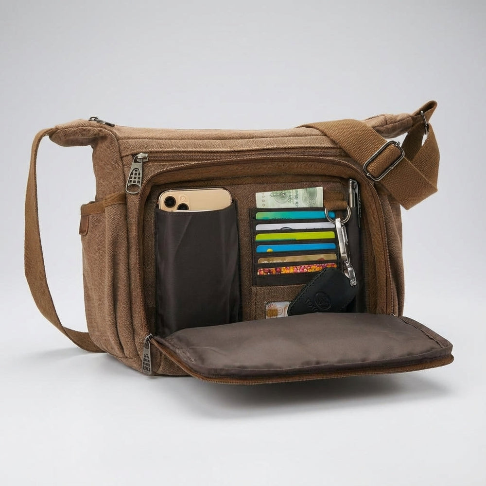 Georganiseerde unisex canvas schoudertas met RFID-blokkering, ideaal voor laptop en tablet.
