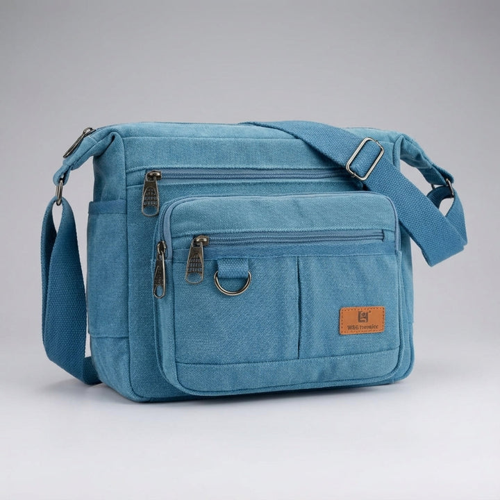 Ruime unisex canvas messenger tas met RFID voor veilige opslag van laptop en tablet.