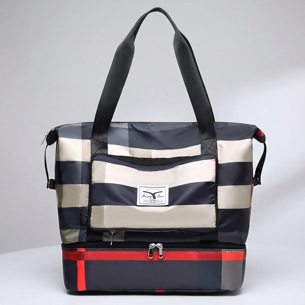 Praktische unisex duffeltas met geïntegreerd bodemvak, ideaal voor schoenen of natte kleding tijdens reizen.