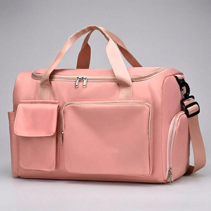 Grote unisex weekendtas/sporttas, zij-aanzicht. Veel ruimte voor reisbenodigdheden; multifunctioneel.