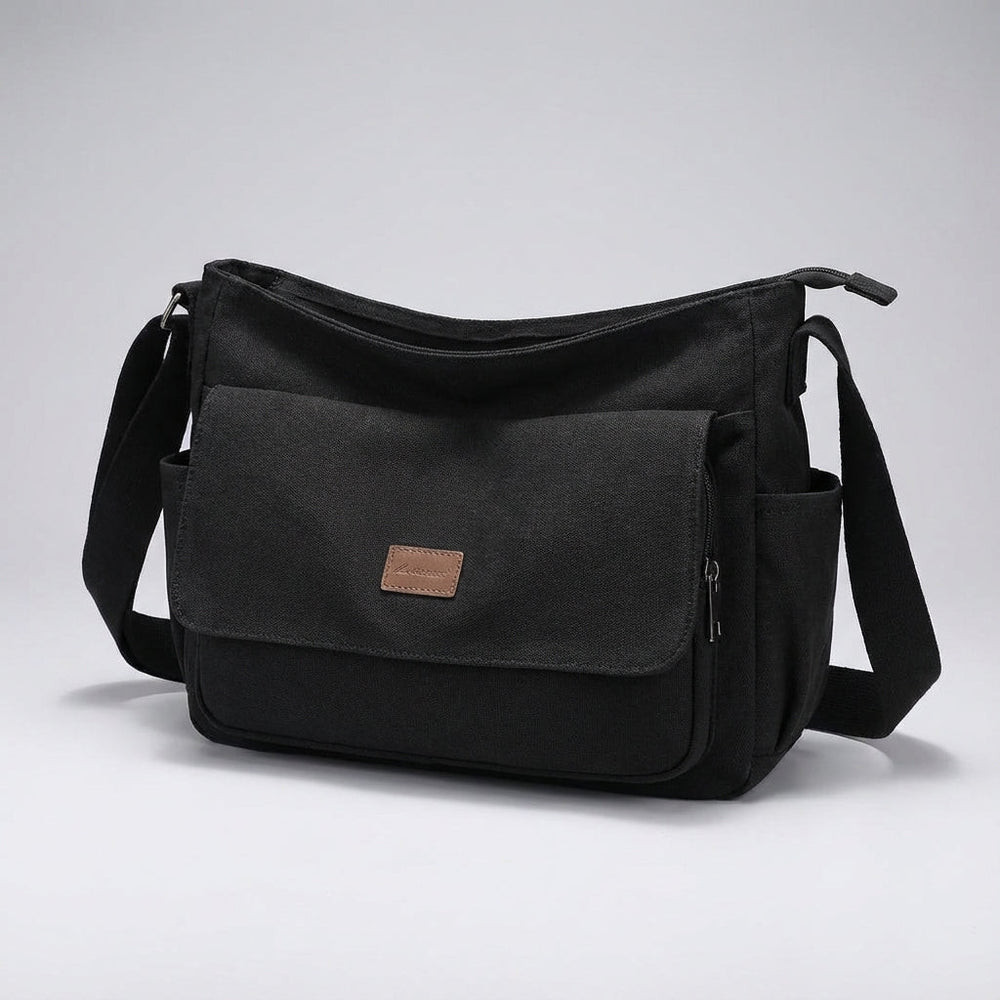 Georganiseerde Satchelix messenger bag voor laptops, met meerdere vakken voor dagelijkse benodigdheden.