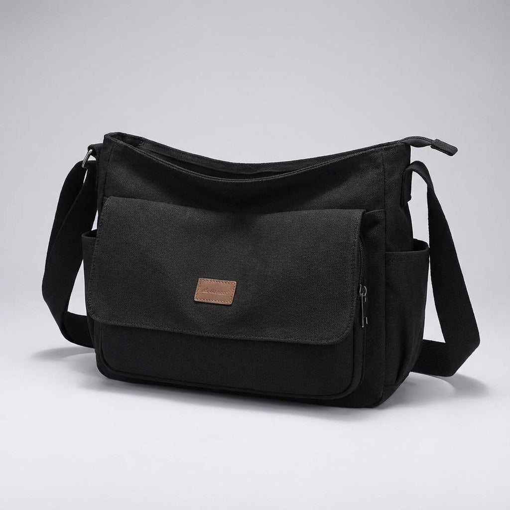 Georganiseerde Satchelix messenger bag voor laptops, met meerdere vakken voor dagelijkse benodigdheden.