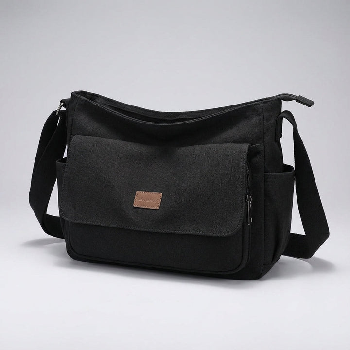 Georganiseerde Satchelix messenger bag voor laptops, met meerdere vakken voor dagelijkse benodigdheden.