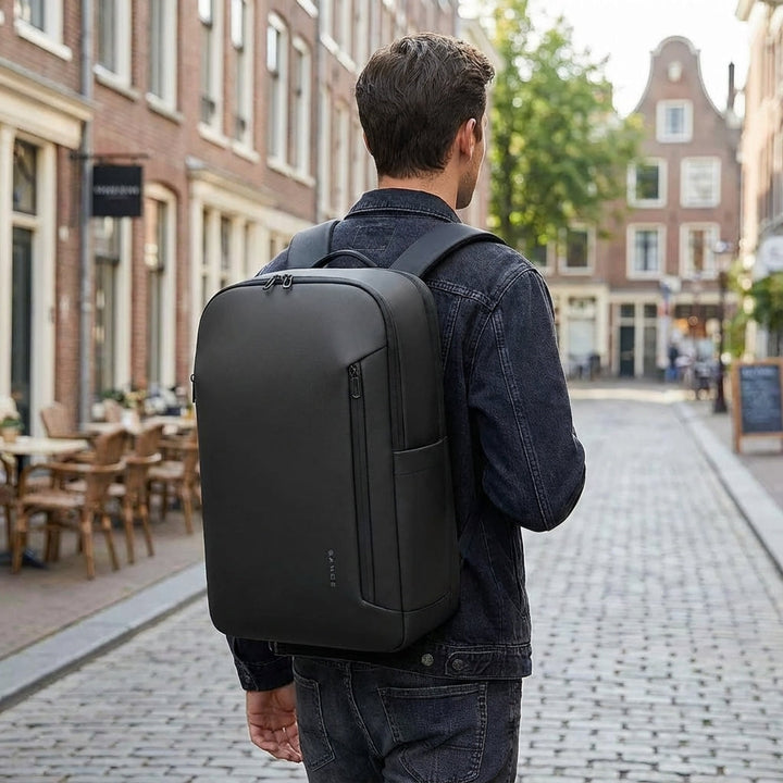 Unisex Transitex laptop reisrugzak in grijs, waterdicht en georganiseerd, ideaal voor werk en reizen.