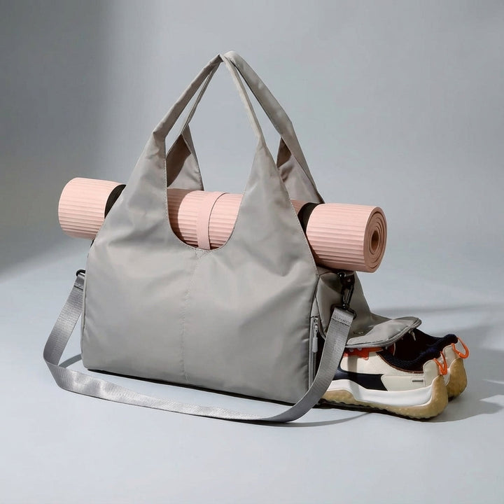 Handige waterafstotende duffelbag, unisex, met schoenenvak. Geschikt als sporttas, gymtas of compacte reistas.